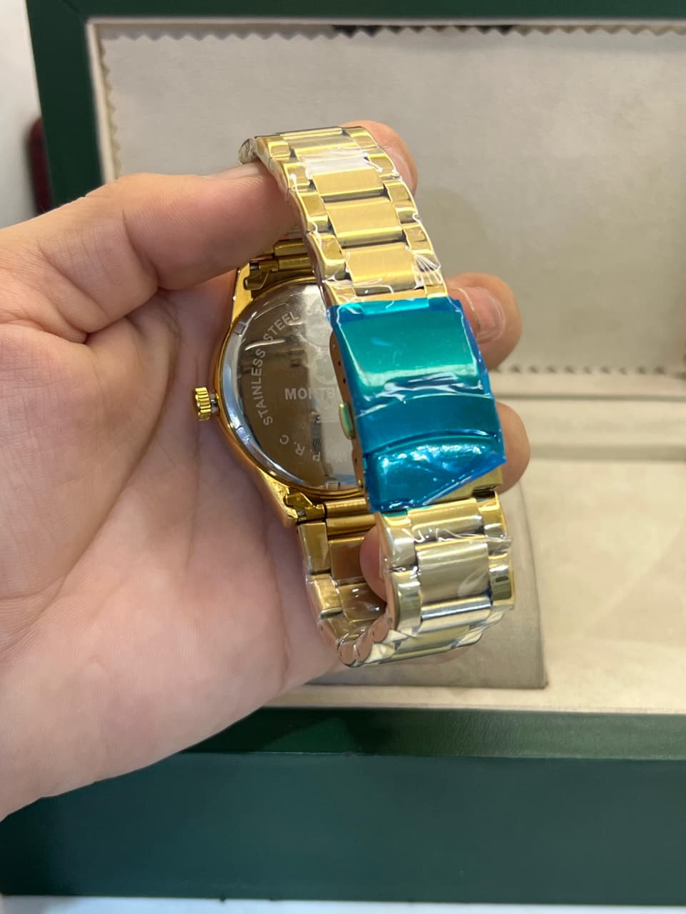 Gold Stainless Steel Watch with Dragon Dial & Date Display